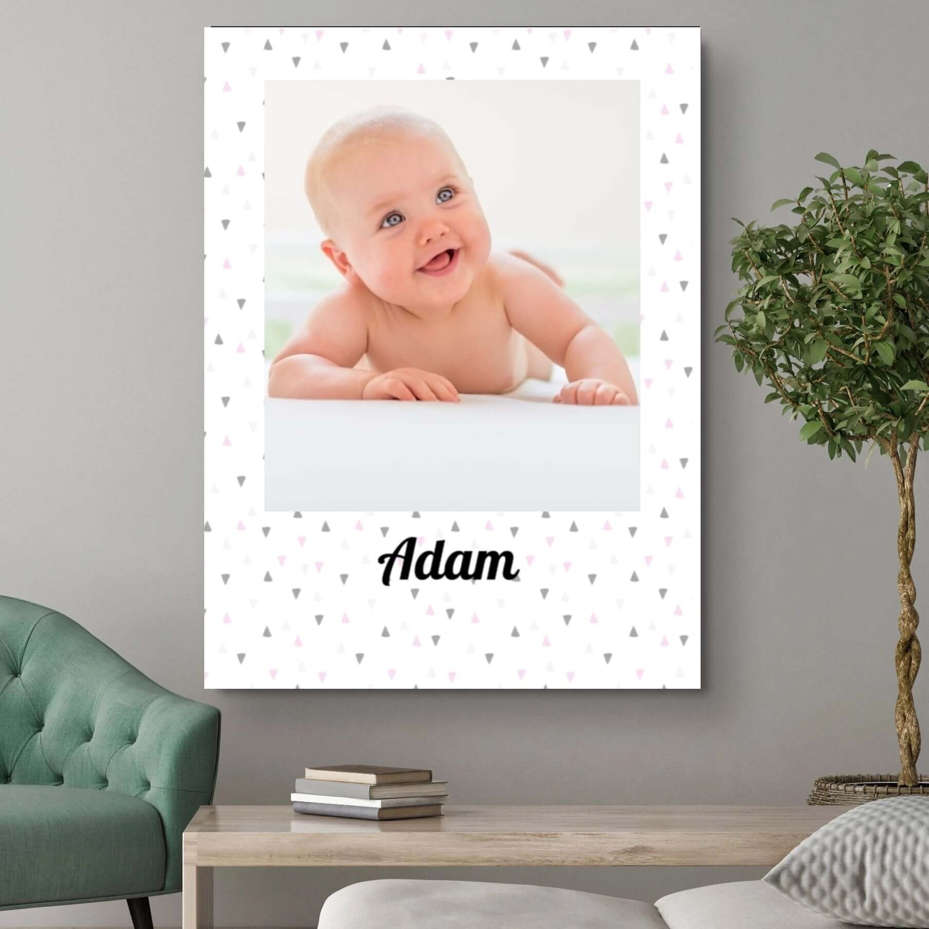 Personalized baby photo canvas with name 'Adam' in a home setting, featuring a cute baby on a decorative background.